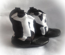 Load image into Gallery viewer, Black &amp; White Cow Print Baby Cowboy Boots with Faux Leather